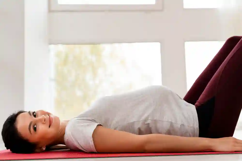 Pregnant woman relaxing during a calming prenatal massage
